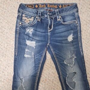 Rock Revival Women's Skinny Jeans in Dark Blue Distressed Wash